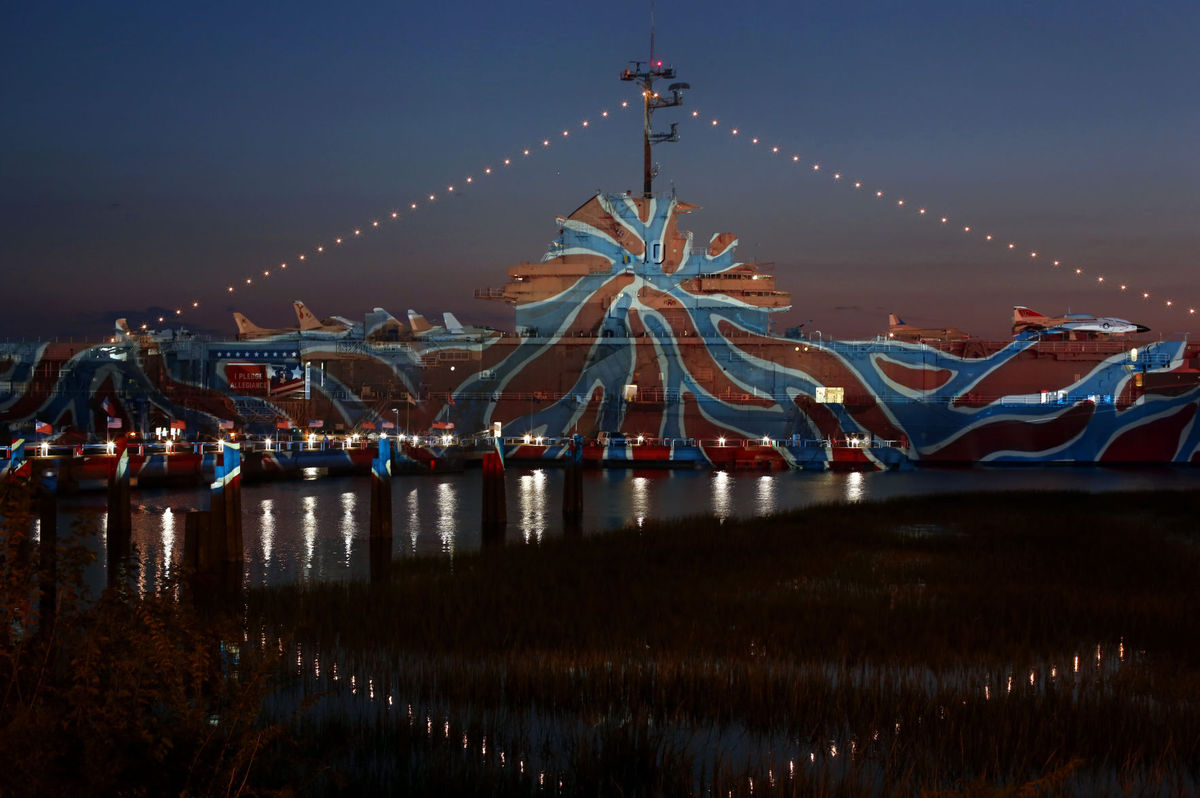 USS Yorktown at Patriots Point lit up by Swiss artist Gerry Hofstetter 